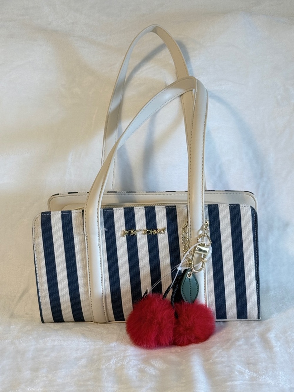 Betsey Johnson Striped Navy and Cream Tote with Red Cherry Faux Fur Charm